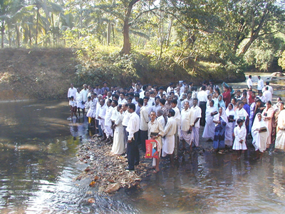 Church members wait for the start of a baptism ceremony in Kerala, India.