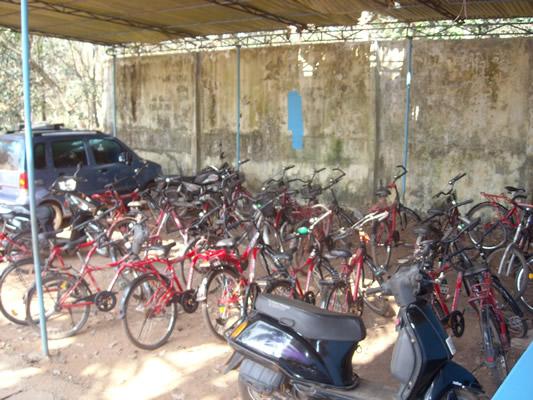 Both teachers and students ride bicycles to school each day.